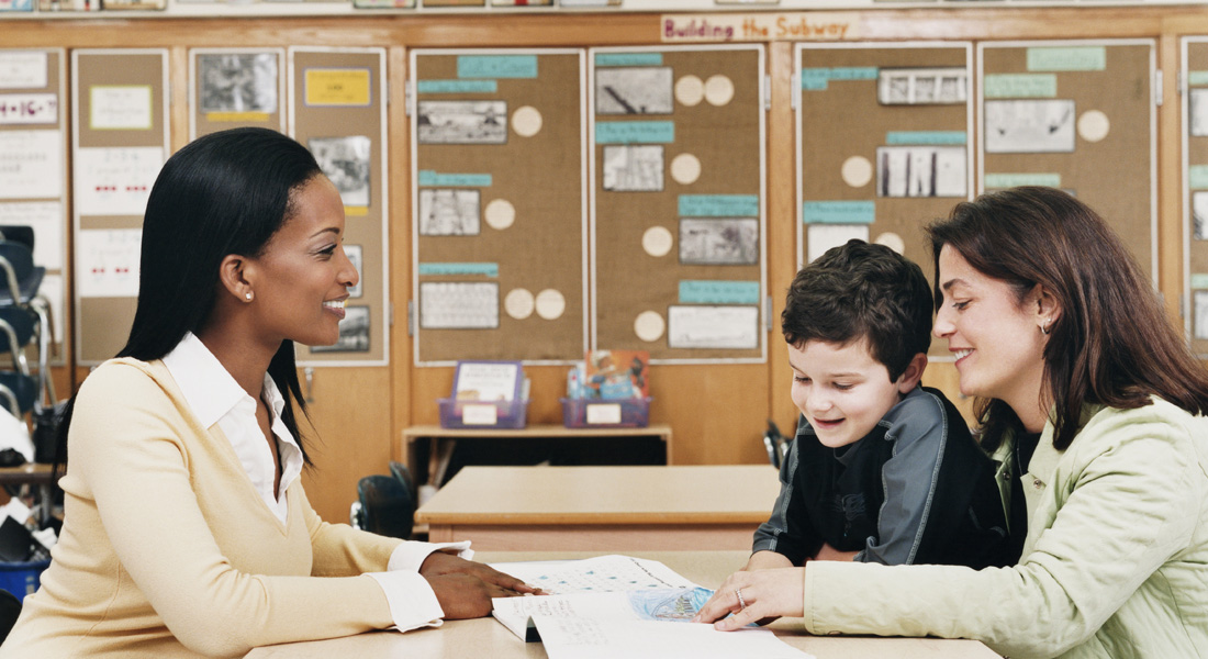 Teacher talking with a parent