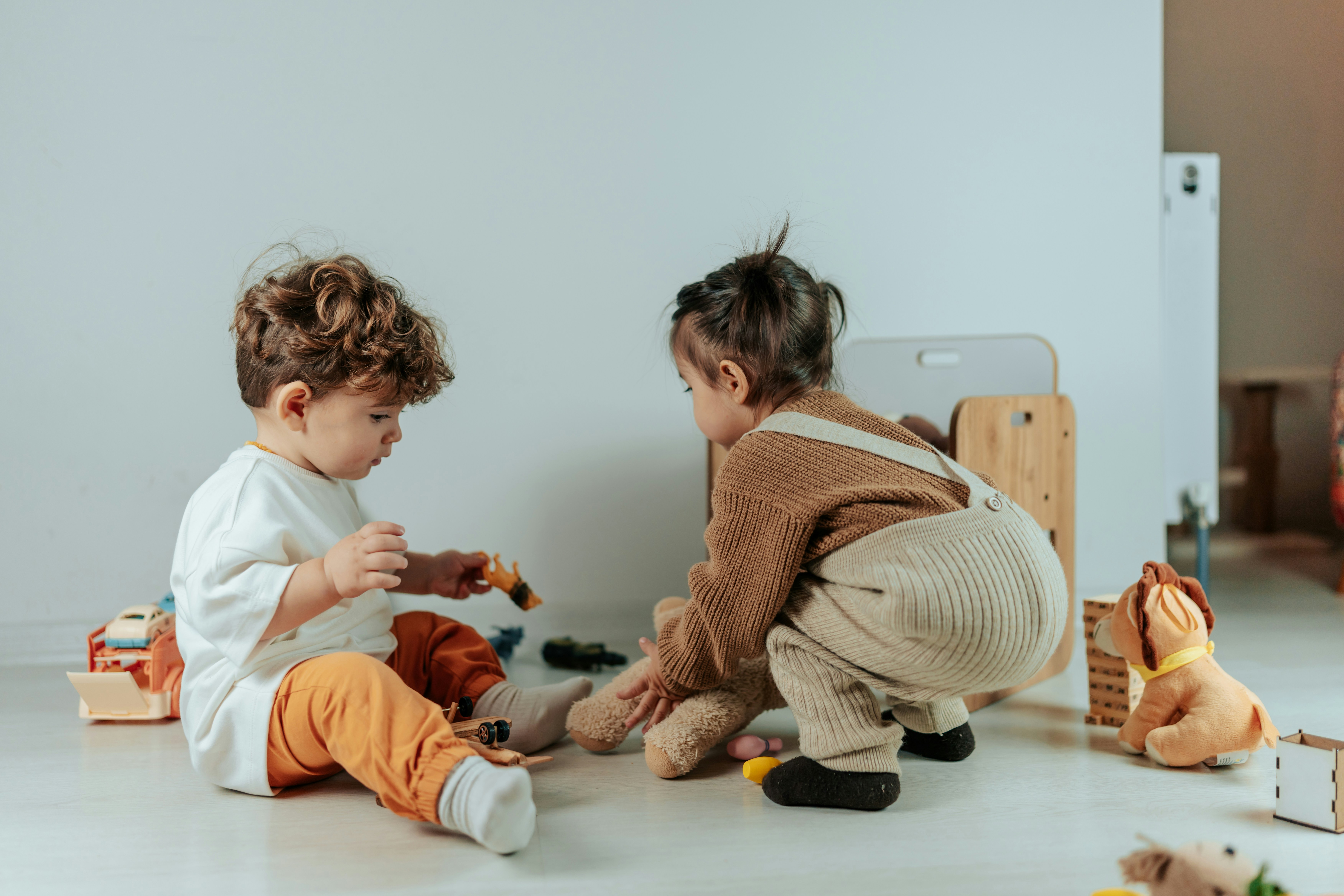 Children playing and learning together in a preschool environment